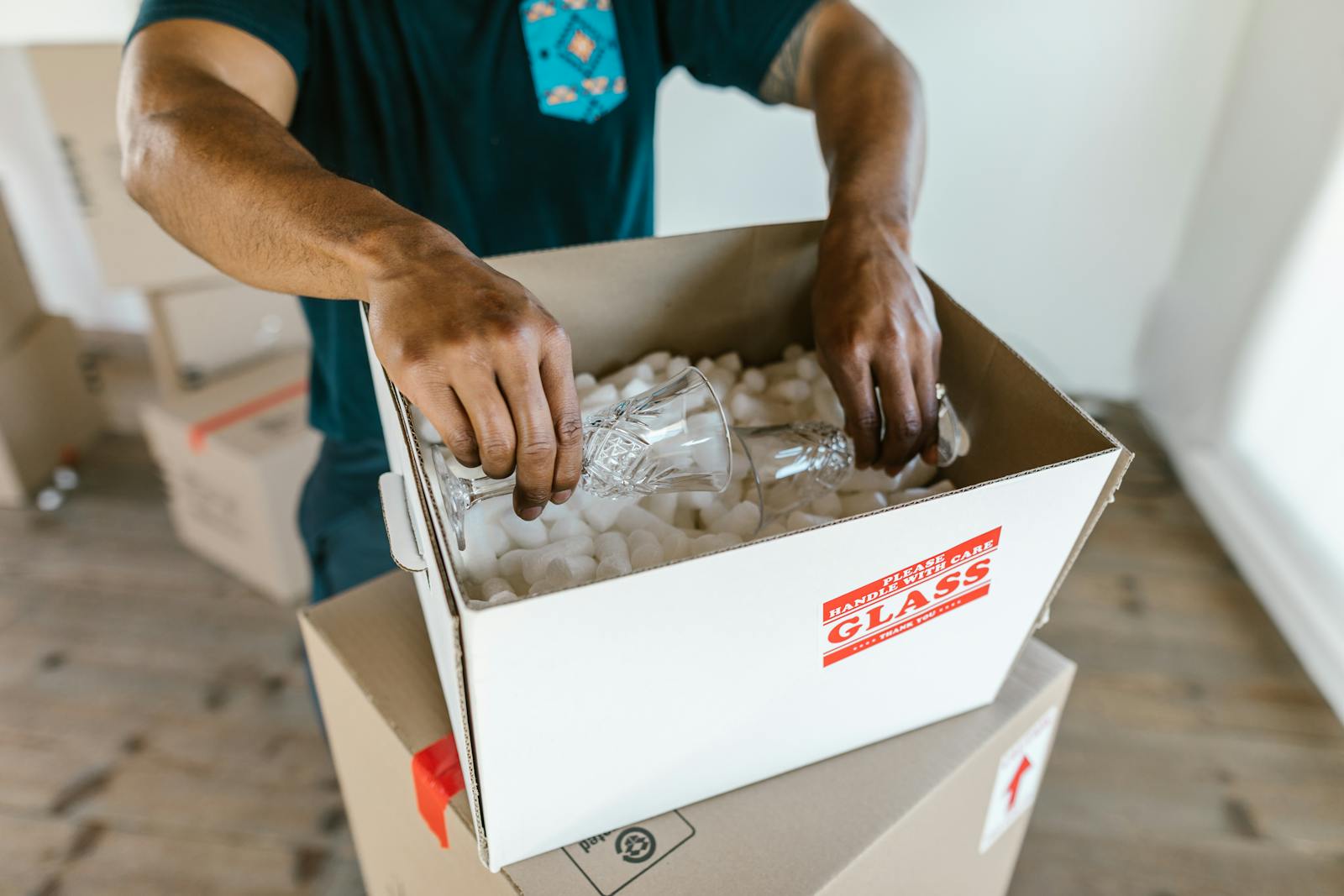 Up N Go specialist packing fragile glassware